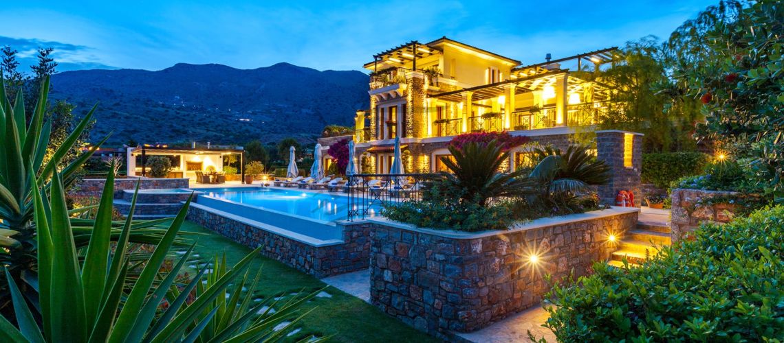 Lasithi, Elounda. For sale is a luxurious 632 sq m villa on a 4,026 sq m plot with a private heated 81 sq m pool, just 100 meters from the sea. property first image